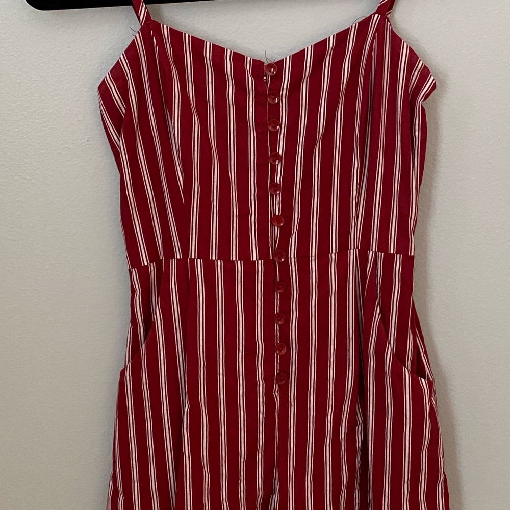 Striped romper in new condition.